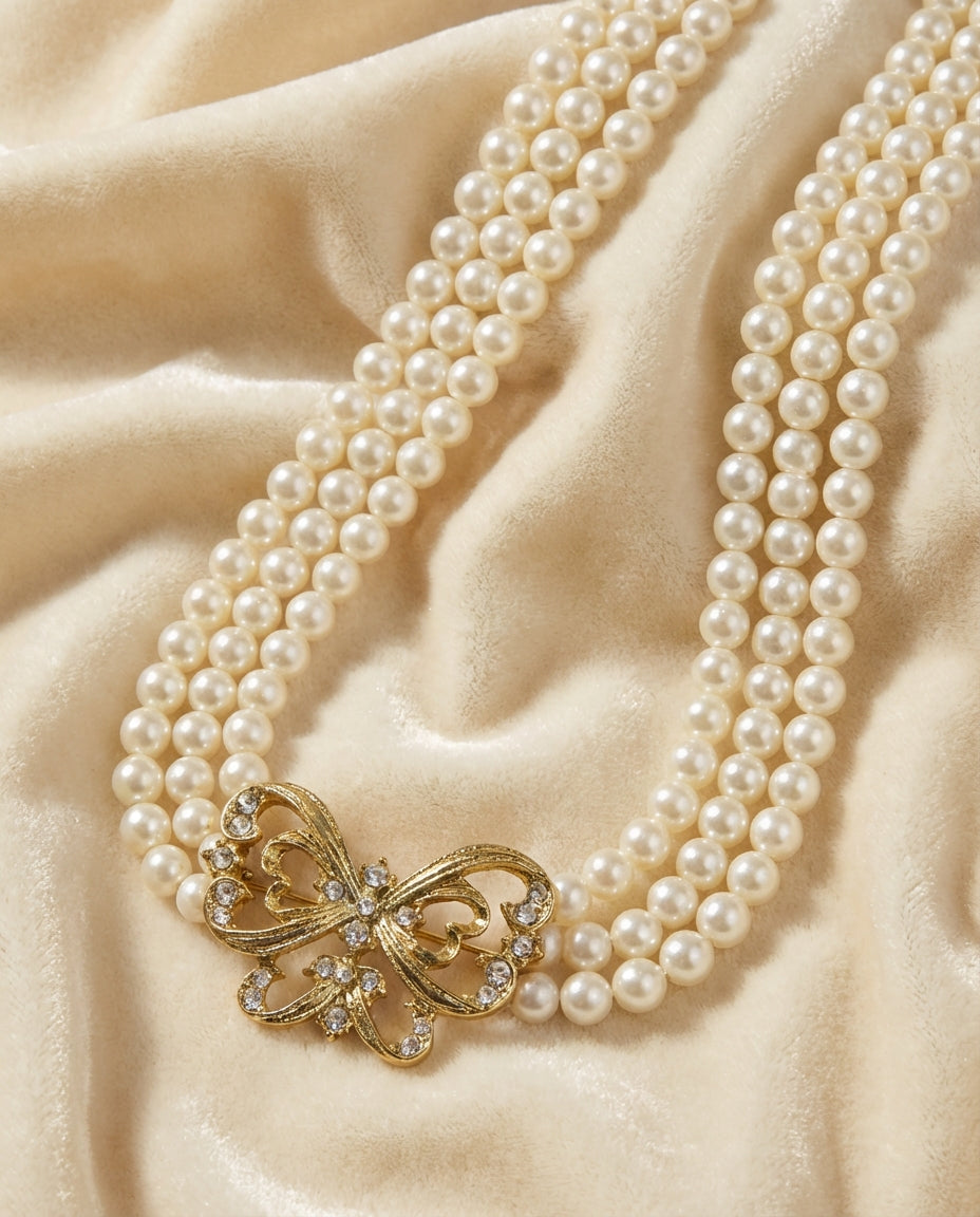 Vintage Nina Ricci Faux Pearl and Butterfly Necklace