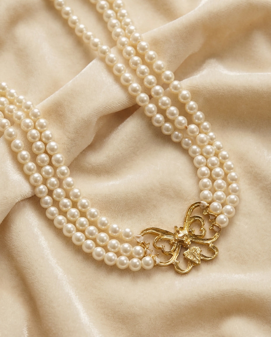 Vintage Nina Ricci Faux Pearl and Butterfly Necklace